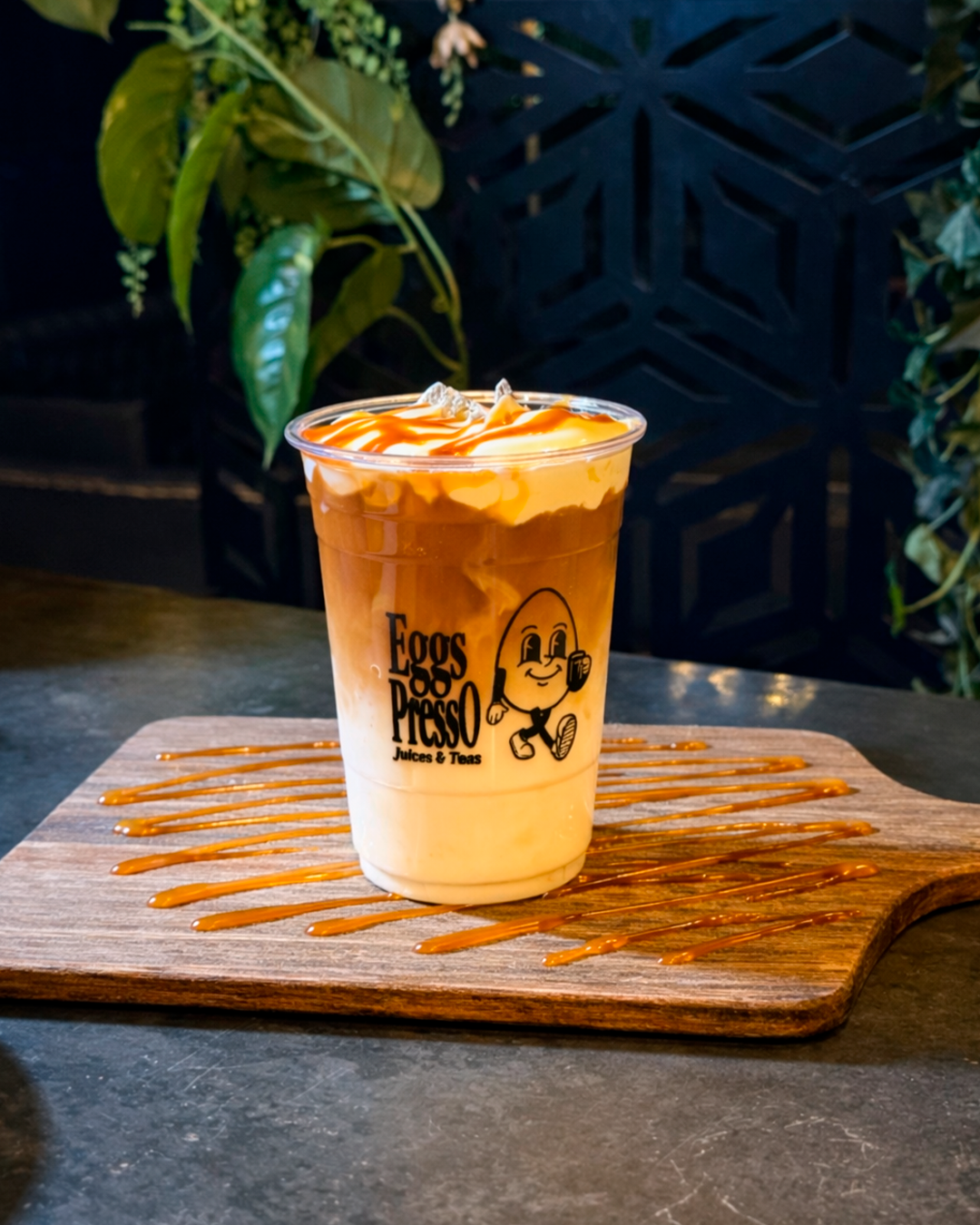 Refreshing iced coffee with cream at Eggspresso Muffins